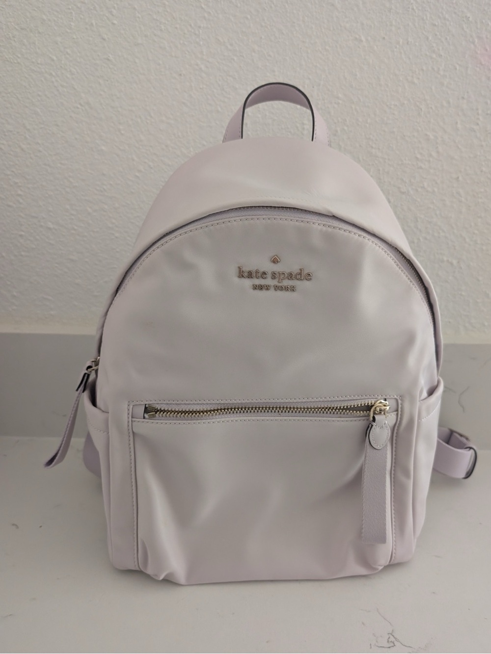 Kate Spade Chelsea Medium backpack in color Lilac Moonlight